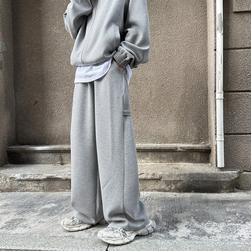 Men’s Grey Deconstruction Wide-Leg Sweatpants – Streetwear Curved Sword Track Pants in Light Gray or Black | Grey deconstruction sport curved sword sweatpants for men in spring